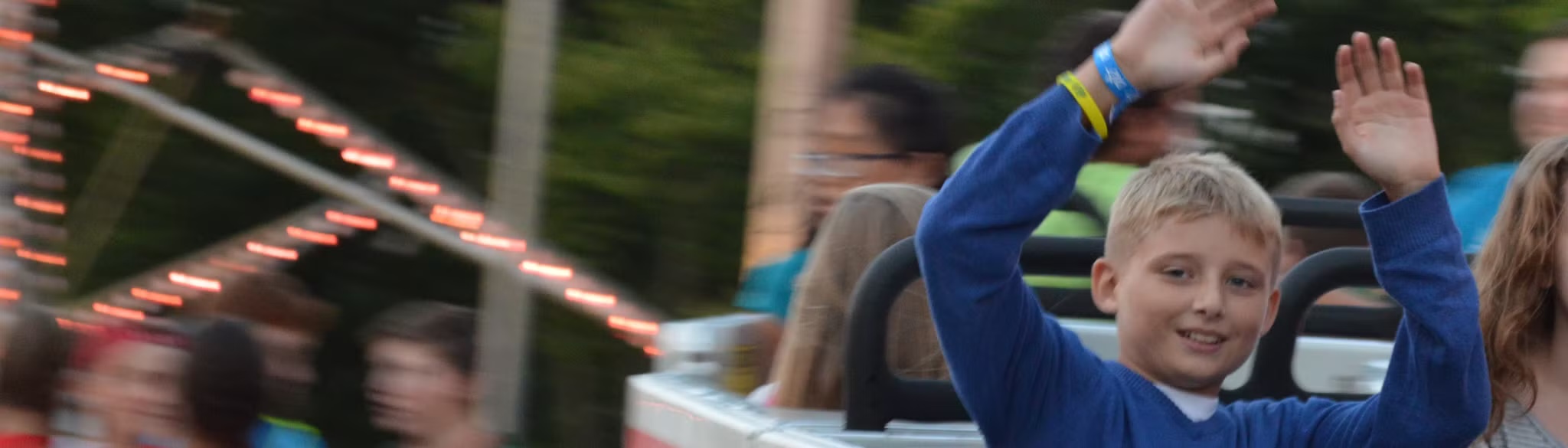 Child enjoying a carnival ride